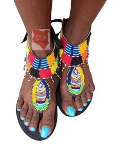 Beautifully designed African gladiators, beaded sandals, Masai sandals, summer sandals, African sandals Made from fine leather and very fine beads. Available in all sizes. Wholesale is available upon request at a discount price. Shipping is via DHL EXPRESS with a GUARANTEED delivery between 3-5 days worldwide. **BUY MULTIPLE ITEMS, PAY SHIPPING ONCE** FREE SHIPPING FOR ALL ADDITIONAL ITEMS IN YOUR CART Check out more sandals from the store. variety to chose from https://www.etsy.com/shop/CaribuK Multicolor Open Toe Barefoot Sandals For Summer, Summer Beaded T-strap Sandals With Open Toe, Beaded T-strap Sandals With Open Toe For Summer, Summer Beaded Ankle Strap Sandals, Summer Beaded T-strap Open Toe Sandals, Beaded Ankle Strap Sandals For Summer, Summer Adjustable Beaded T-strap Sandals, Summer Festival Beaded T-strap Sandals, Beaded Sandals For Beach Festivals