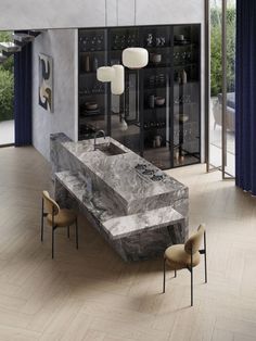 a large marble table in the middle of a room