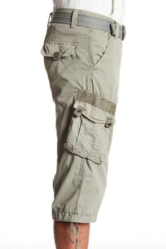 Style an on-trend look in cargo shorts crafted from breathable cotton for comfort during casual outings. 18" inseam; 10" front rise (size 32) Zip fly with button closure 100% cotton Machine wash, tumble dry
 Imported Model stats: 6'1" height, 32" waist. Model is wearing size 32. Military Style Cotton Cargo Shorts With Patch Pockets, Military Style Cotton Cargo Shorts With Belt Loops, Bermuda Cargo Pants With Utility Style, Relaxed Fit Bermuda Cargo Bottoms, Utility Bermuda Bottoms With Cargo Pockets, Khaki Bermuda Cargo Pants With Cargo Pockets, Khaki Military Cotton Shorts, Summer Military Style Cotton Cargo Pants, Military Style Khaki Cotton Shorts