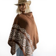 Poncho knitted with alpaca fibers and merino wool. Double Pampa Guard design. Very soft and warm for the cold seasons. Buy your handmade poncho made in Argentina! Approximate measurements: 85 x 65cm. Approximate weight: 430 grams. Beige Alpaca Poncho One Size, Luxury Alpaca Poncho One Size, Brown Alpaca Cape Poncho, Bohemian Poncho For Outdoor, One Size, Beige Alpaca One-size Poncho, Alpaca Fiber, Cold Season, Knitted Poncho, Alpaca