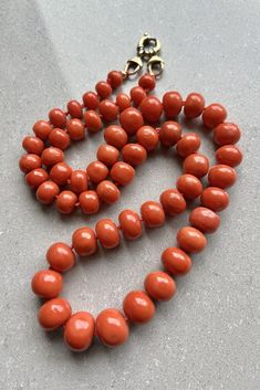 Antique 14k Yellow Gold Large Mediterranean Undyed Red Coral Necklace 112g - 25" Amazing Natural Mediterranean Undyed Red Coral  Necklace Size is 25" Long Tip to Tip Necklace has Amazing Natural 8mm to 15mm Mediterranean Undyed Red Coral Oval Beads Weight is 112.0 Grams on my scale Metal: 14k Yellow Gold Clasp Knotted Necklace - Necklace was Just Re Strung In Great Condition, Any Questions Please Feel Free to ask Thank you Luxury Traditional Red Coral Beaded Necklace, Cheap Coral Beaded Necklaces With Round Beads, Cheap Handmade Coral Jewelry, Luxury Red Coral Beaded Necklaces With Gemstone Beads, Luxury Coral Necklaces With Gemstone Beads, Cheap Handmade Coral Beaded Necklaces, 22k Coral Necklace, Luxury Coral Beaded Necklace For Formal Occasions, Red Coral Necklace Jtv