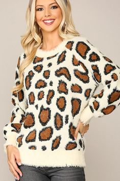 Lovely soft knit sweater in fuzzy leopard print. Styled in Cream. Fabric: 70% Nylon, 30% Acrylic. *Model is 5'7" wearing a small. Winter Leopard Print Long Sleeve Sweater, Leopard Print Long Sleeve Winter Sweater, Long Sleeve Leopard Print Winter Sweater, Leopard Print Long Sleeve Sweater For Winter, Trendy Leopard Print Winter Sweater, Winter Leopard Print Crew Neck Sweater, Leopard Print Long Sleeve Sweater, Trendy Leopard Print Crew Neck Sweater, Leopard Print Crew Neck Top For Winter