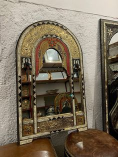 a mirror and a stool in a room Full Length Mirror Gold, Inlay Mirror, Moroccan Henna, Bone Inlay Mirror, Moroccan Mirror, Black Mirror Frame, Handmade Mirror, Handmade Mirrors, Luxury Mirror