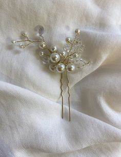 Wedding Hair Vine, Pearl Bridal Wedding Hair Pins, Minimalist Wedding hair Clip, Crystal HairPin Set of 2 This pearl bridal wedding hair pins are perfect for a bling wedding theme. Gorgeous wedding hair clip with shining crystals and beautiful pearls. It looks beautiful and attractive. You will love it. PEARL BRİDAL HAİR PİN SET OF 2  .All of my handmade products are ready to be shipped. .IMPORTANT: Please note that these are guidelines only - no delivery time is absolutely guaranteed - on occasions items sent by airmail can take longer than the guideline times due to customs delays that are beyond my control. Please don't hesitate to ask me questions! :) Wedding Hair Clips Side, Minimalist Wedding Hair, Bride Hair Pearl Pins, Wedding Hair Pearl Pins, Bling Wedding Theme, Pearl Hairpins Wedding, Bridesmaid Hair Pearl Pins, Bridal Hair Vine Pearl, Wedding Hair Clip