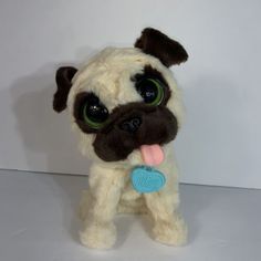 a small stuffed pug dog with big eyes and a blue tag on it's collar