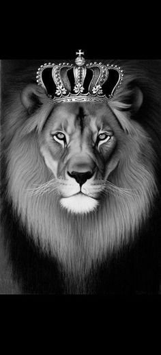 a black and white photo of a lion with a crown on it's head