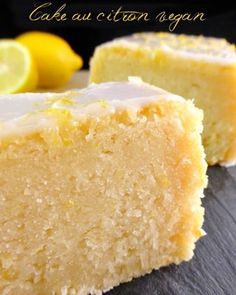 two slices of lemon cake with white frosting