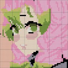 a cross - stitch pattern of a woman's face with green leaves on it