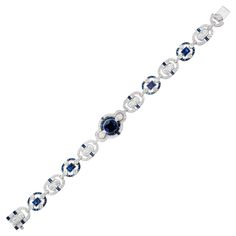 Absolutely stunning GIA Certified sapphire and diamond bracelet. This bracelet begins with a GIA certified, simple heat only, 2.00ct oval sapphire at the center and is accented by halos of baguette sapphires and round diamonds. A staggering 330 stones adorn this Art Deco style 18k white gold bracelet. It measures at 7.25 in length. There is a built in catch with and underside safety. The design and craftsmanship is simply spectacular. 1 oval blue sapphire, approx. 2.00cts GIA Certificate #623407 Antique Earrings Vintage, Antique Sapphire Rings, Diamond Rings Vintage, Vintage Antique Wedding, Vintage Antique Engagement Rings, Antique Wedding Bands, Diamond Sapphire Engagement Ring, Gia Certificate, Antique Engagement Rings Vintage