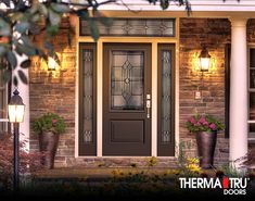 the front door of a house with potted plants