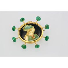 This is part of Chairish’s Fine Jewelry assortment.  Renaissance Brooch with Emerald accents in 18K Yellow Gold  Renaissance Brooch with Emerald accents in 18K Yellow Gold First of all, this brooch started out as a Vintage button which I turned into a brooch with an 18K gold rim and Emerald accents.  Also, the brooch is 45MM round with 8 Emerald Beads in a sputnik style.  Finally, this unique brooch weighs in at 11.20 grams.  Please reference the measurements noted in the description above for t Yellow Gold Enamel Brooches, Luxury Formal Enamel Pin, Luxury Yellow Gold Cabochon Brooches, Luxury Cabochon Brooches For Anniversary, Luxury Green Pendant Brooch, Luxury Anniversary Brooches With Cabochon, Luxury Gold Enamel Brooch, Luxury Green Brooch Jewelry, Luxury Gold Brooches With Cabochon