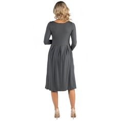 A fall wardrobe must have. This midi maternity dress for women is great for any occasion whether casual or dressy. Featuring a round neckline, long sleeves, midi length hemline, pleated waist, and pockets for a finishing touch. Pair this fit n flare dress with ballet flat for a casual look or create a dressy look with heels. Available in nine beautiful color options, youll want one in every color. Made from a soft and comfortable stretch material that is machine washable for easy care. Midi Maternity Dress, Maternity Dress, Fit N Flare Dress, Ballet Flat, Pocket Dress, Fall Wardrobe, Dress For Women, Gray Dress, Maternity Dresses