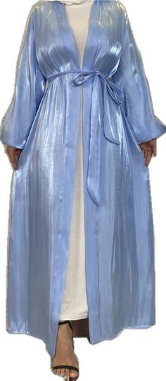 Fitted Abaya For Spring, Fitted Long Abaya For Spring, Spring Modest Maxi-length Thobe, Formal Spring Abaya With Long Sleeves, Elegant Long Sleeve Abaya For Spring, Spring Formal Long Sleeve Abaya, Blue Maxi Length Abaya For Spring, Spring Blue Long Sleeve Abaya, Spring Formal Fitted Abaya