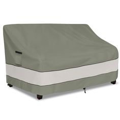 an outdoor furniture cover on top of a bed