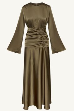 Indulge in luxury and sophistication with our Shams Satin Side Rouched Maxi Dress in Olive. The elegant hue is enhanced by the side rouched detailing, creating a flattering silhouette. The dramatic flare sleeves add a touch of drama and femininity to this must-have piece. Model is 5'7" and is wearing size XS/58". Modest Silk Dress, Olive Silk Dress, Olive Green Fashion, Elegant Silk Dresses, Maxi Dress Long Sleeve, Modest Evening Dress, White Dress Formal, Nikkah Dress, Modest Maxi