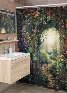 a bathroom with a painting on the shower curtain