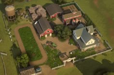 an aerial view of a farm with several buildings