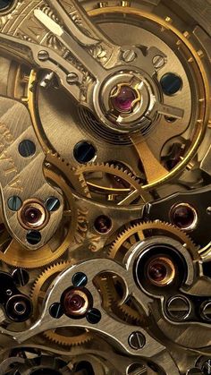 the inside workings of an old watch with text that reads, systems