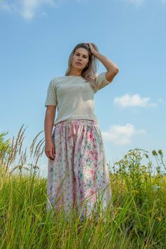 This boho floral patchwork midi skirt features a Zero waste design with a mix of vintage prints, making it the perfect sustainable skirt for your hippie Summer clothing collection. The cotton skirt is handmade with unique pieces of vintage calico and then hand tie - dye particular colors tone - pink and beige. Elastic waistband with a drawstring. The elastic is fully enclosed in a channel, so it's easy to tighten or loosen.   You can choose to keep the drawstring in the center or the side or behind.  Can be worn inside-out for deliberately faded look. French seams inside show the care in which this skirt was pieced together.  One size skirt best fits a small to large. Flat measurements: WAIST: max 26"  HEM WIDTH: 47.5"  LENGTH: 32"  100% European cotton, vintage calico. Spotting, staining Bohemian Floral Patchwork Skirt For Festival, Bohemian Patchwork Maxi Skirt For Spring, Spring Festival Patchwork Maxi Skirt, Bohemian Maxi Skirt With Floral Patchwork, Spring Festival Maxi Skirt With Patchwork, Floral Patchwork Tiered Skirt For Festivals, Casual Long Skirt With Floral Patchwork, Floral Print Flowy Maxi Skirt For Festival, Flowy Floral Print Maxi Skirt For Festival