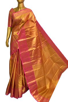 Shop exclusive collection of tissue kanjeevaram silk saree range is here in our inventory. Buy this amazing collection with an elegant and maximized broad pallu and all-over zari work on the border as well to make it look more relevant for any evening party. Color: A shade of golden and magenta dual-toned color Technique: Amazing work of golden zari traditional weaving on the whole saree Fabric: Tissue Kanjeevaram Quality: Indyvogue's Assurance of Pure Silk Mark Certified Saree NOTE: Comes with Kanchipuram Saree, Color Techniques, Silk Sarees Online, Traditional Weaving, Super Sale, Sarees Online, Exclusive Collection, Blouse Piece, Pure Silk