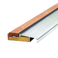 an aluminum and wood door seal with a wooden edge on a white background, showing the bottom