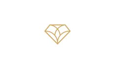 a gold diamond logo on a white background