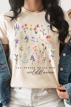 Wildflowers Graphic T Shirts.Unisex Crew Neck Short Sleeve Tees.Crafted from premium materials, tailored to your lifestyle, ensuring a comfortable fit for any occasion.Family Group Uniforms Birthday Party Gift Concert Festival Events.High Quality Direct To Film Printed Graphic Design.100%COTTON,HEATHER(52%COTTON,48%POLY),ATH.HEATHER,BLACK HEATHER(90%COTTON,10%POLY)NICARAGUAMade In: Nicaragua Spring Multicolor T-shirt With Text Print, Spring Multicolor Text Print T-shirt, Spring Crew Neck T-shirt With Custom Print, Spring Casual Tops With Custom Print, Casual Spring Tops With Custom Print, Casual Custom Print Top For Spring, Spring Custom Print Crew Neck T-shirt, Multicolor Printed Tops For Spring, Spring Crew Neck Top With Custom Print