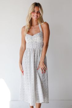 Breezy Composure Blue Striped Floral Halter Midi Dress Lined Midi Sundress For Summer, Chic Striped Fitted Sundress, Striped Sundress Midi Dress For Vacation, Striped Sundress For The Beach, Striped Midi Dress For Summer Vacation, Chic Striped Sundress For Summer, Chic Striped Maxi Sundress, Chic Striped Summer Dresses, Chic Striped Lined Midi Dress