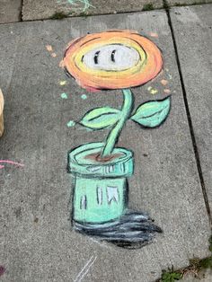 a drawing of a flower in a jar on the sidewalk