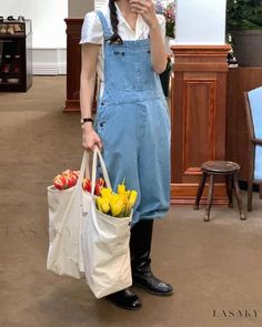 Lasaky - Subtle Reasoning Society Clothing: Tianas Blue Loose Straight-Leg Denim Overalls Casual Blue Cotton Denim Jumpsuit, Casual Light Blue Overalls For Spring, Light Blue Casual Overalls For Spring, Spring Light Blue Casual Overalls, Casual Blue Denim Jumpsuit, Non-stretch Blue Denim Overalls, Blue Cotton Overall Jeans, Blue Cotton Overalls Jeans, Light Blue Cotton Overalls With Pockets