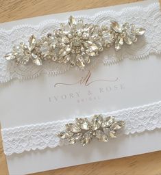 Please note I am currently on a short break, all orders placed will be shipped on Monday 28th October 2024.  Link to Store - https://ivoryrosebridalau.etsy.com This Beautiful Wedding Garter Set is sure to impress!  The set includes a "Keepsake" garter which features a beautiful soft white lace band with a stunning Silver Rhinestone, Cubic Zirconia & Pearl Applique attached. The "Toss" garter features a white band and a matching Silver Cubic Zirconia & Rhinestone Applique. Keepsake Garter measure Pearl Applique, Bride Garter, Leg Garter, Wedding Garter Set, Wedding Garters, Lace Bands, Custom Gift Boxes, Bridal Garter, Rhinestone Appliques