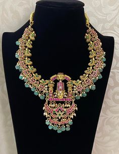 This Jadau kundan Balaji necklace is a stunning piece of bridal jewelry, featuring intricate and traditional Jadau kundan work. Handcrafted with precision, this necklace exudes beauty and elegance, making it the perfect accessory for any special occasion. Elevate your style with this timeless and luxurious piece. Kundan Work, Ethnic Necklaces, Necklace Bridal, Elevate Your Style, Bridal Jewelry, Special Occasion, Fine Jewelry, Necklaces, Beauty