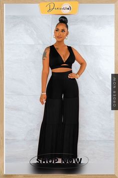 Bandage Crop Top and Wide Leg Pants Two Piece Set Stretch Wide Leg Two-piece Bottoms Set, Stretch Wide-leg Two-piece Bottoms, Two-piece Wide Leg Bottoms For Vacation, Two-piece Wide Leg Pants For Night Out, Wide Leg Two-piece Pants For Night Out, Black Two-piece Summer Pants, Vacation Two-piece Wide Leg Bottoms, Black Two-piece Bottoms For Summer, Wide Leg Two-piece Set For Night Out