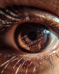 an extreme close up shot of the iris of a person's eye