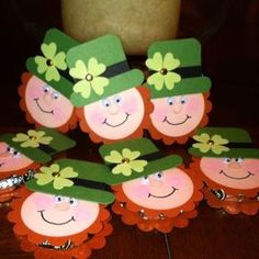 st patrick's day crafts for kids with leprechaun hats and shamrocks