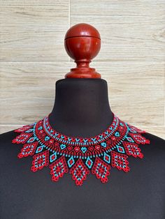 This choker is a unique piece made entirely by hand, in a very colorful boho style, to wear on any occasion. This choker has a unique design, made especially for you, perfect to wear at parties or as a special gift. Shipped anywhere in the world. Red Handwoven Beaded Necklace For Festivals, Handwoven Red Beaded Necklace For Festivals, Colorful Boho Style, Colorful Boho Fashion, Mexican Necklace, Colorful Choker, Huichol Art, Necklace Colorful, Colourful Necklace