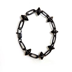 Handcrafted mens bracelet with a heavy pewter antiqued black spikes chain. Super cool and fashion forward, wear it with Jeans and a T-shirt or dressed up. Bracelet measures 7.5" Available in any custom size Made with love in Los Angeles Complimentary gift wrapping provided All sales final. Black Punk Chain Bracelet As A Gift, Black Punk Style Chain Bracelet As Gift, Black Punk Style Chain Bracelet For Gift, Punk Style Black Chain Bracelet Gift, Black Gothic Jewelry With Spikes, Gothic Metal Bracelets With Spikes, Black Metal Spiked Jewelry, Black Metal Jewelry With Spikes, Black Metal Bracelets With Spikes