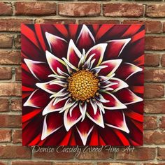 a red and white flower painted on a brick wall with the words dance, cosyy mood live art