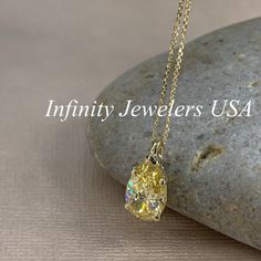 "The pendant pictured is canary yellow simulated diamond #7060 -Approximate total carat weight: approx. 3.60ctw diamond equivalent -Center Stone Size: 12x8mm - approx. 3.60ct diamond equivalent -Center Stone Shape: pear / tear drop -Gem Type: simulated diamond -Stone Clarity: VVS1 -Stone Color: Canary Yellow -Moh's Scale: 8.5 hardness -Metal Type and Purity: 14k yellow gold -Setting: 5 prong basket head -Size: Height with bail approx 15.30mm x Width approx. 8mm -Chain: delicate 14k gold chain / Gold Solitaire Teardrop Necklace With Prong Setting, Gold Teardrop Solitaire Necklace With Prong Setting, Yellow 14k Gold Jewelry With Diamond Accents, Yellow Birthstone Jewelry In Cubic Zirconia, Oval Yellow Cubic Zirconia Jewelry, Yellow Cubic Zirconia Birthstone Jewelry, Yellow Pear-shaped Gemstone Jewelry, Elegant Yellow Teardrop Pendant Jewelry, Yellow Pear-shaped Fine Jewelry