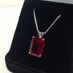 "Gorgeous Ruby Pendant Necklace * 8ct Emerald Cut Ruby measures 14mm x 10mm * Solid Sterling Silver * 18\" Sterling Silver Chain Included This Gorgeous 8ct Ruby is a laboratory grown stone. It is identical to the genuine stone in every way, including chemistry, composition and hardness, with an outstanding cut, clarity and color refraction. Hallmarked & Gift Ready! Matching Earrings and/or Ring also Available! TIMELESS, BEAUTIFUL & UNIQUE FINE ART JEWELRY" Formal Octagon Ruby Jewelry, Classic Ruby Necklace With Prong Setting, Classic Solitaire Gemstone Necklace For Formal Occasions, Classic Formal Solitaire Gemstone Necklace, Sterling Silver Jewelry With Rectangular Prong Setting, Sterling Silver Jewelry With Rectangular Stone And Prong Setting, Classic Sterling Silver Octagon Jewelry, Sterling Silver Jewelry With Rectangular Stone In Prong Setting, Classic Ruby Necklaces For Formal Occasions