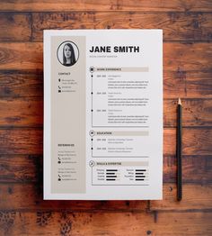 a professional resume on top of a wooden table