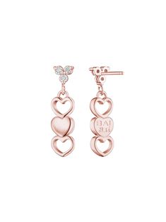 Inspired by the Graces earrings, these sustainable three heart 14K Gold designs exude timeless luxury. With a diamond accent, these earrings are bound to elevate your style. Stack them with the Cupid Studs or style them with Love Collection Rings and Necklaces. Handcrafted in New York & Shipping Worldwide. Elegant Rose Gold Heart Cut Earrings, Rose Gold Heart Earrings Fine Jewelry, Elegant 14k Gold Double Heart Earrings, Heart-shaped Rose Gold Earrings With Diamond Accents, Heart Shaped Rose Gold Earrings With Diamond Accents, Luxury Rose Gold Heart Earrings, Rose Gold Heart Drop Earrings For Anniversary, Elegant Rose Gold Diamond Heart Earrings, Elegant 14k Gold Earrings For Valentine's Day