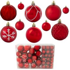 red christmas balls and ornaments are in a clear box