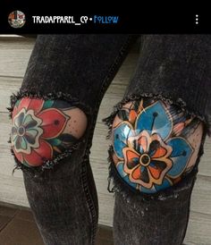 a person's feet with tattoos on their ankles and legs, both covered in ripped jeans