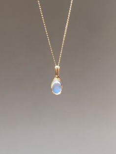 9k yellow gold rainbow moonstone pendant. New production. Each moonstone is natural and one-of-kind and may have natural inclusions. Moonstone: 8 x 6 mm oval cut cabochon Pendant: 18.5 x 7.5 mm Weight: 1.5 grams Pendant only, chain not included. Yellow Gold Chalcedony Jewelry With Cabochon, Chalcedony Cabochon Yellow Gold Jewelry, Handmade 14k Gold Oval Cabochon Jewelry, Oval Cabochon Moonstone Jewelry, Moonstone Gemstone Jewelry In Oval Cabochon, Dainty Moonstone Jewelry With Cabochon, Gift Moonstone Ring In 14k Gold With Oval Cabochon, Handmade 14k Gold Oval Moonstone Ring, Oval Moonstone Gemstone Jewelry