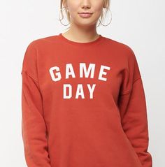 Game Day Crewneck sweatshirt is a great gift for your boyfriend, best friend or anyone that loves football, baseball or basketball! This Ring spun unisex Sweatshirt is a cozy addition to your holidays! SIZING:For best fit, please use our measurement chart. Measure your favorite sweatshirt from arm pit to arm pit and top to bottom and compare with our chart. We are as accurate as possible but industry standards for manufacturing may have variation up to one inch in length and width. Fits larger t Crew Neck T-shirt For Game Day In Fall, Sporty Tops With Ribbed Cuffs For Game Day, Game Day Football Season Crew Neck Sweatshirt, Football Season Game Day Crew Neck Sweatshirt, School Spirit Crew Neck Sweatshirt For Baseball Season, Baseball Season Crew Neck Sweatshirt With School Spirit, School Spirit Sweatshirt With Crew Neck For Baseball Season, Crew Neck Sweatshirt For Baseball Season With School Spirit, Game Day Tops With Lettering, Crew Neck