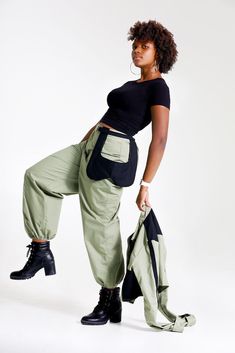 "Let them catch your vibe wearing this edgy pant set with matching jacket. This combo is crafted with cotton, mixed with denim, and designed with three pockets on the jacket, and three pockets on the pants, Cargo style! The jackets design is color blocked for that edginess it brings and the pants has a unique outer pocket on the left front and a half belt closure. Pair up this outfit with a cute bandeau top, or bodysuit and combat boots, Make all your friends wish they had this set too. All of o Military Style Cotton Parachute Pants With Multiple Pockets, Fall Cotton Parachute Pants With Cargo Pockets, Fall Cotton Parachute Pants With Patch Pockets, Cotton Parachute Pants With Patch Pockets For Fall, Trendy Cotton Parachute Pants For Work, Trendy Green Parachute Pants With Multiple Pockets, Green Cotton Techwear Cargo Pants, Military Style Cotton Parachute Pants With Hip Pockets, Green Parachute Pants For Fall Streetwear