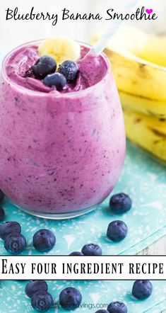 blueberry banana smoothie in a glass with bananas on the side