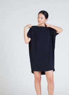 KAAREM - Angle Mini Dolman Open Back Dress - Black Blue Chic Short Sleeve Button Back Dress, Chic Short Sleeve Dress With Button Back, Mini Dress With Draped Sleeves For Work, Workwear Mini Dress With Draped Sleeves, Oversized Mini Length Dresses For Daywear, Oversized Mini Dress For Daywear, Chic Oversized Mini Dress, Chic Oversized Short Sleeve Dresses, Elegant Oversized Mini Dress