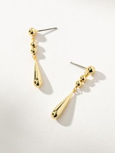 On the List Unique Drop Dangle Earrings in Gold | Uncommon James Trendy Teardrop Earrings For Evening, Elegant Metal Dangle Drop Earrings, Chic Linear Drop Earrings For Formal Occasions, Elegant Metal Drop Earrings, Trendy Teardrop Earrings For Formal Occasions, Trendy Formal Teardrop Earrings For Pierced Ears, Gold Long Drop Teardrop Earrings For Pierced Ears, Trendy Formal Teardrop Earrings, Elegant Gold Drop Earrings For Pierced Ears